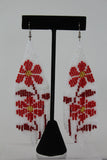 JENNIKA FRINGE EARRINGS FLOWER W/ WHITE BACKGROUND