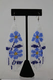 JENNIKA FRINGE EARRINGS FLOWER W/ WHITE BACKGROUND